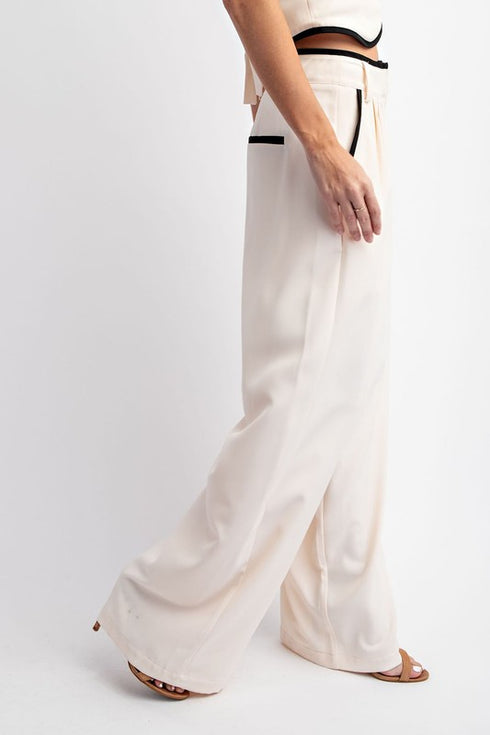 CREAM WITH BLACK PANTS
